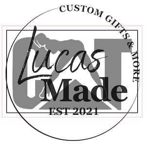 May include: Black and white logo with the text "Lucas Made" and "Custom Gifts & More" in a circle around the logo. The text "EST 2021" is below the logo.