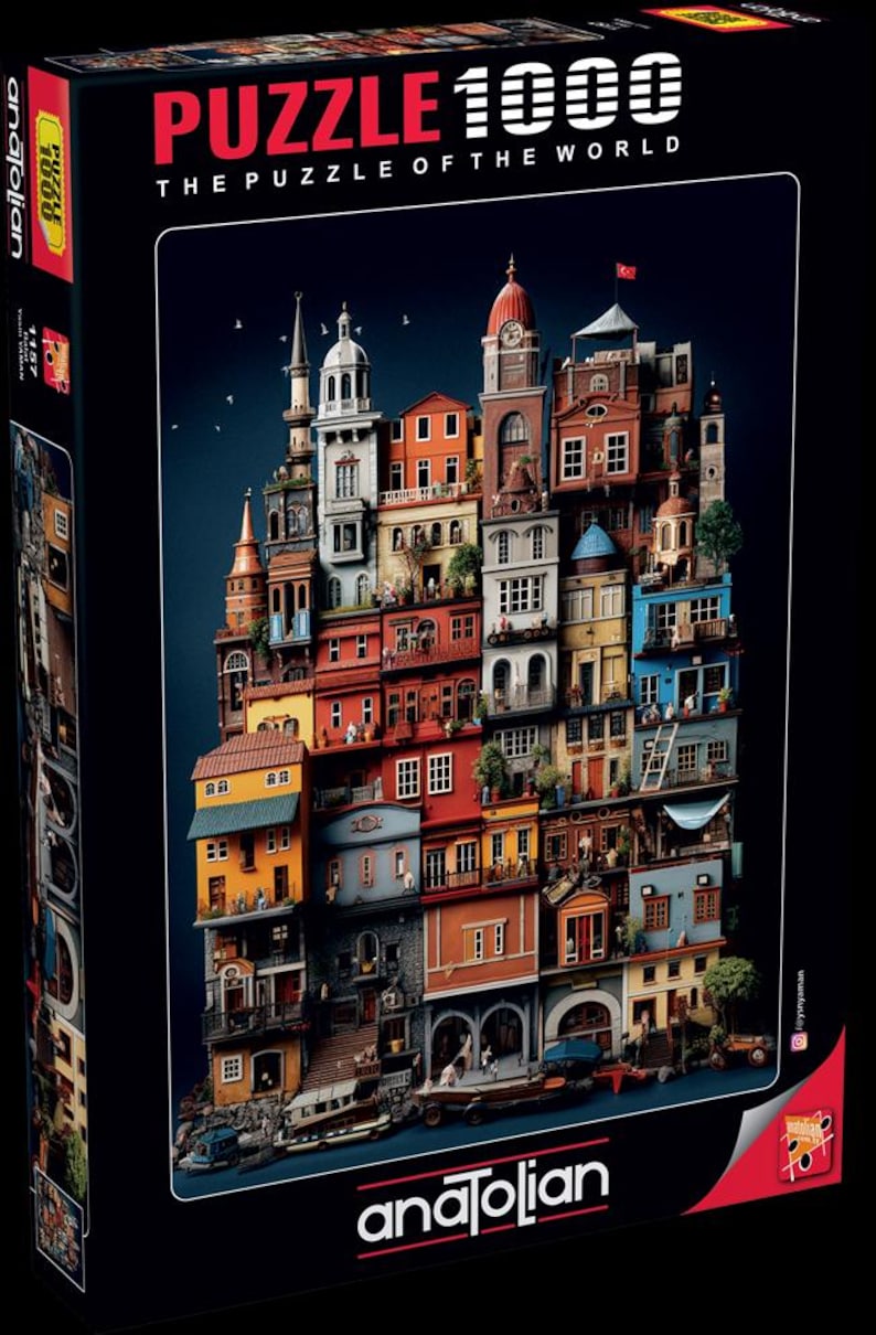 K&ouml;nnte beinhalten: Eine 1000-teilige Puzzle-Box mit einer farbenfrohen Illustration einer phantasievollen Stadt. Auf der Box steht "PUZZLE 1000" und "THE PUZZLE OF THE WORLD". Die Box ist schwarz und tr&auml;gt den Markennamen "anatolian".