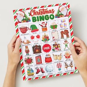 May include: A Christmas Bingo game card with a red and green striped border. The card features festive illustrations like Santa Claus, hot chocolate, and a Christmas tree. The words "Christmas Bingo" are at the top.