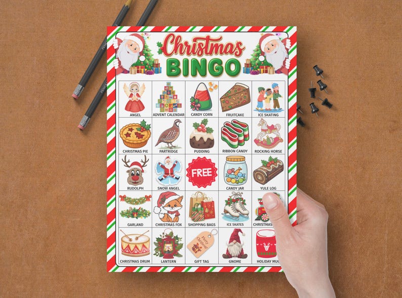 May include: A Christmas Bingo game card with a red and green striped border. The card features festive illustrations and the text "Christmas BINGO". The card includes images of angels, a Christmas pie, and a gnome.