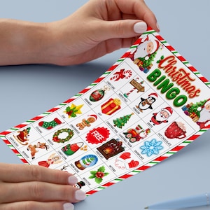 May include: Christmas Bingo game card with festive illustrations, including Santa Claus, ornaments, and a Christmas tree. The card has a red and green striped border and the words "Christmas Bingo" in a decorative font.