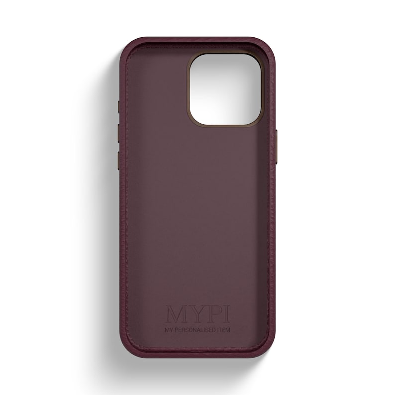 May include: A burgundy phone case with a textured finish and the text "MYPI MY PERSONALISED ITEM" embossed on the back.