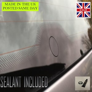 May include: A set of three ceramic mugs with a speckled, matte finish. The mugs are in shades of cream, light gray, and dark gray. Each mug has a simple, minimalist design, perfect for coffee or tea.