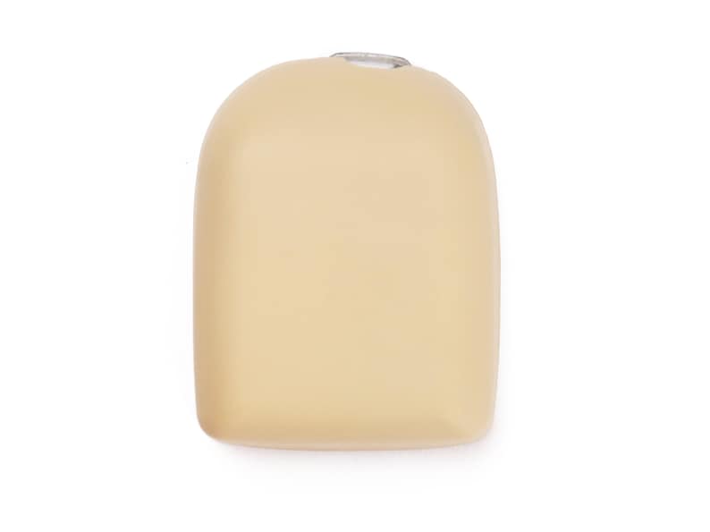 May include: A beige, oval-shaped, silicone ear mold.