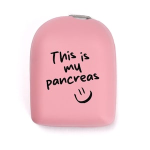May include: A pink silicone case with the text "This is my pancreas" and a smiley face.