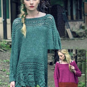 May include: Two women wearing loose-fitting, knitted sweaters with lace detailing. The sweater on the left is teal green and the sweater on the right is a deep pink with a rust-colored lace trim.
