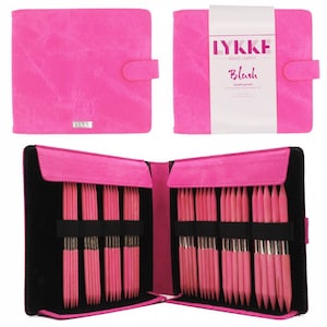 May include: A pink leather case with a set of double-pointed knitting needles. The case has a snap closure and a label that reads "Lykke Make Happy Blush Double Pointed".