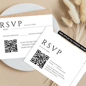 May include: Two white RSVP cards with black text and a QR code. The text on the cards reads "RSVP" and "BY 1ST JULY 20XX". The cards are on a brown surface with a bouquet of dried pampas grass.