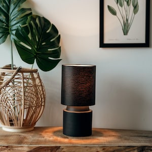 Round Black elegant ceramic table lamp with black fabric shade