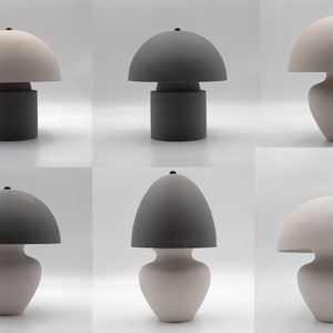 May include: Set of six ceramic table lamps with mushroom-shaped shades. The lamps have a modern, minimalist design and come in two colour combinations: a light grey shade with a dark grey base and a dark grey shade with a light grey base.