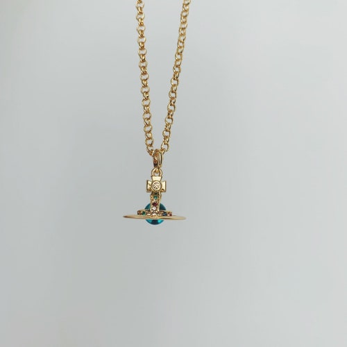 Vivienne Westwood Rose Gold and Mother 