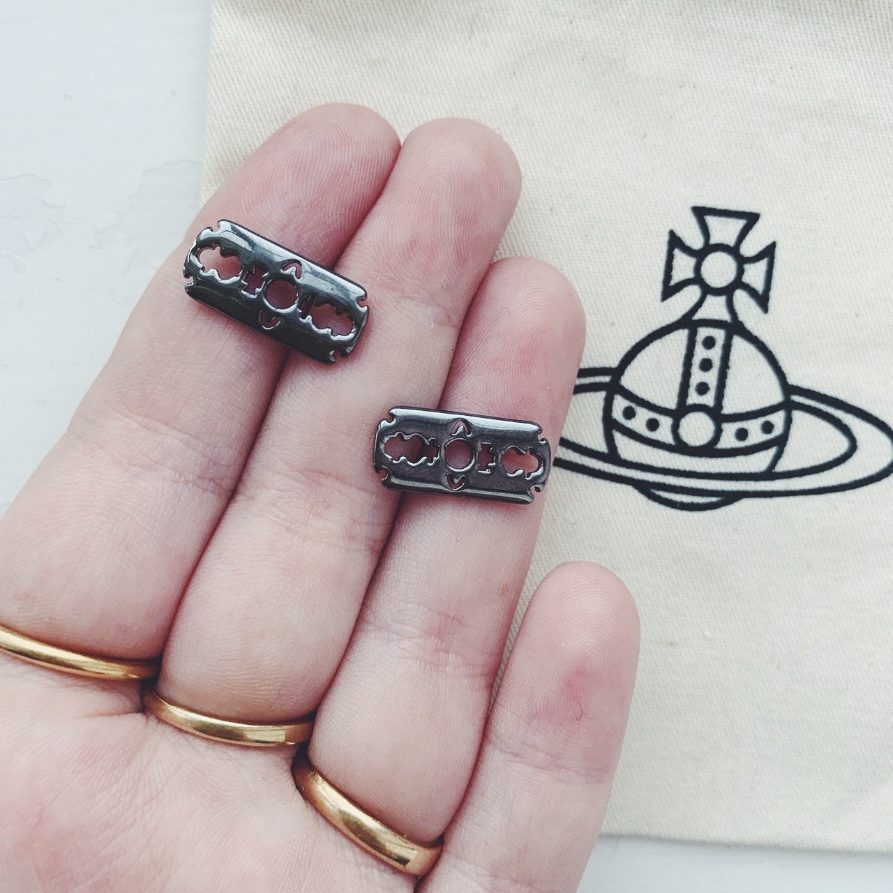 Vivienne Westwood gunmetal razor blade stud earrings Etsy Polska