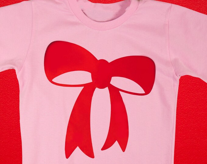 Metallic Red Bow on a Light Pink T-Shirt (Girls AND Ladies Sizes, Cropped or Long)