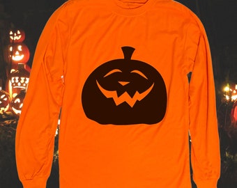 Grinning Pumpkin on Neon Orange Long Sleeve Shirt (Adult Sizes)