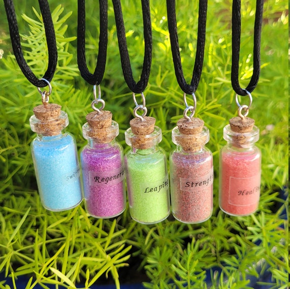Perfume and potion bottle necklace in rose quartz and stainless steel –  Baguette Magick