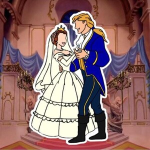 May include: A sticker depicting a cartoon couple dancing in a ballroom setting. The woman is in a white wedding dress and veil, and the man wears a blue coat. The background shows a grand hall with chandeliers and ornate details.