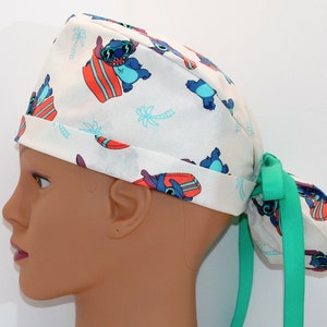 Stitch Surfing   Ponytail Surgical Scrub Cap  2153