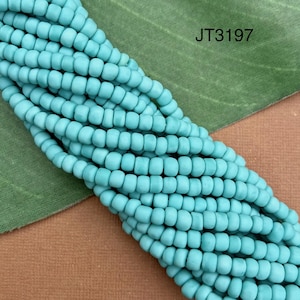 2 hebras - Hebras de vidrio indonesio - Azul huevo de petirrojo mate, hechas en Java