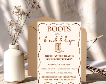May include: A beige invitation card with brown text that reads "BOOTS and bubbly" and "YOU'RE INVITED TO ARY'S BACHELORETTE PARTY". The card is in front of a brown envelope and a white vase with dried flowers.