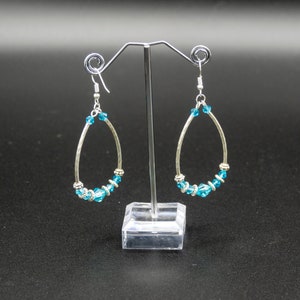 Tibet-style earrings made of aluminum wire and faceted glass beads with Tibetan charms