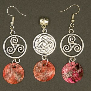 Pendants and earrings in the set with mutt pearl and charms