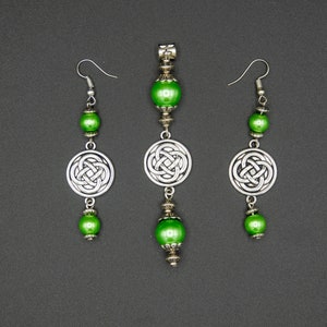 Tibetan-style pendants and earrings with glass beads, Tibetan beads, and round charms