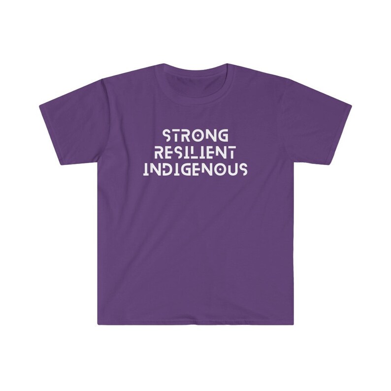 May include: Purple short-sleeved t-shirt with the text "STRONG RESILIENT INDIGENOUS" printed in white.