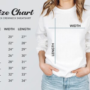 May include: Size chart for a unisex crewneck sweatshirt. The chart shows the width and length measurements in inches for sizes S through 5XL.
