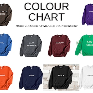 May include: Color chart showing 10 different sweatshirt colors: chocolate brown, royal blue, dark heather grey, maroon, kelly green, orange, navy blue, black, white, and purple.  "COLOUR CHART" and "MORE COLOURS AVAILABLE UPON REQUEST" are written in white text on a white background.