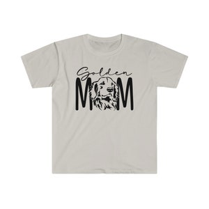 K&ouml;nnte beinhalten: Ein hellgraues T-Shirt mit einer schwarzen Grafik eines Golden Retriever Hundes und dem Text "Golden Mom".