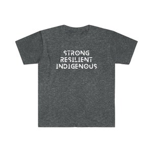 May include: A dark heather grey t-shirt with the text "STRONG RESILIENT INDIGENOUS" printed in white on the back.