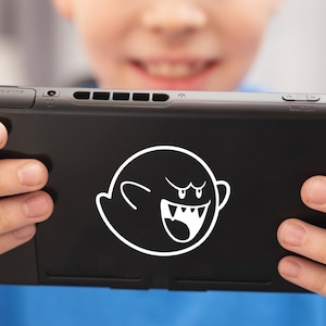 Child holding Nintendo Switch