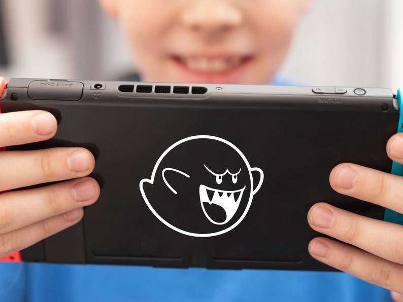 Child holding Nintendo Switch