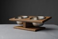 Tilted Cat & Small Dog Feeder: Elevated Double Bowls, Wood Stand (375 ml / 12.7 fl oz / 1.6 cups) product logo