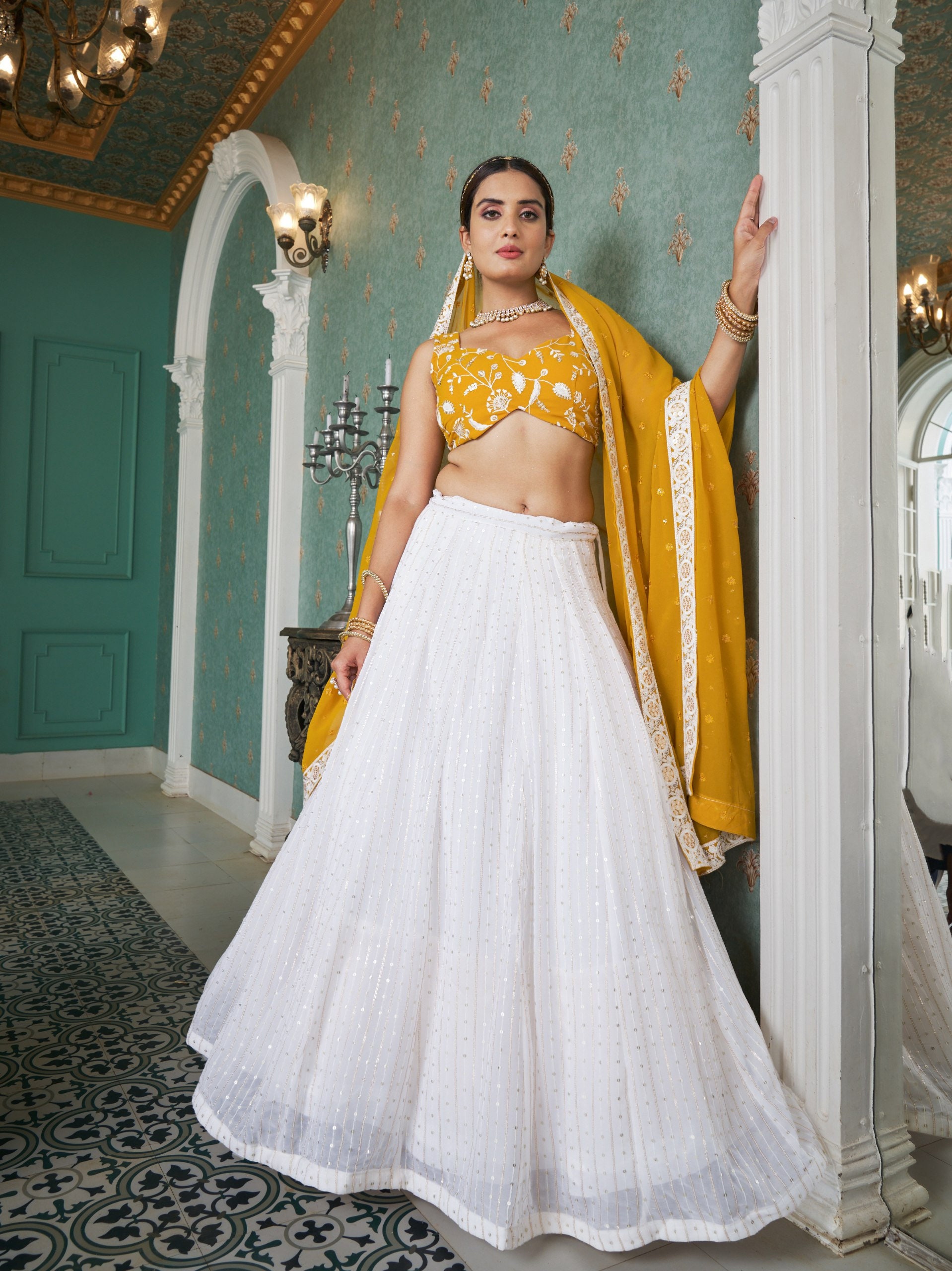 white lehenga with black blouse