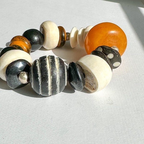 Jumbo Orange Resin Focal Beaded Bracelet with Wood Faceted White Bone and Batik Large with Saucer Bone Accent Beaded Bracelet