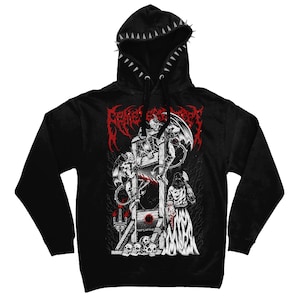 May include: A black long-sleeve hooded sweatshirt featuring a row of silver spikes along the hood edge. The front graphic displays a red and white illustration of a guillotine, winged figures, skulls, and a hooded executioner holding a skull.