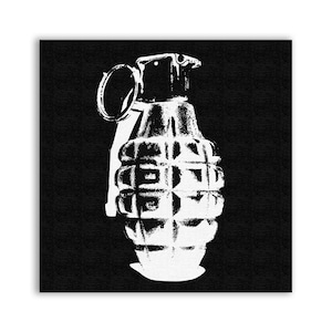 May include: A white silhouette of a grenade against a black background. The grenade has a pin and a handle.