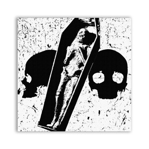 May include: Black and white image of a skeleton in a coffin with two skulls in the background. The image has a distressed, vintage look.