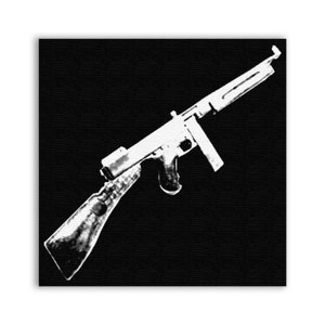 May include: A black and white image of a submachine gun on a black background.