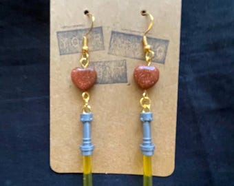 Pendientes de sable de Rey