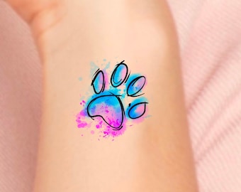 May include: A watercolor paw print tattoo design with blue, pink, and purple colors.