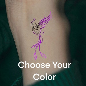 May include: A temporary tattoo of a purple phoenix with the text "Choose Your Color" below it.