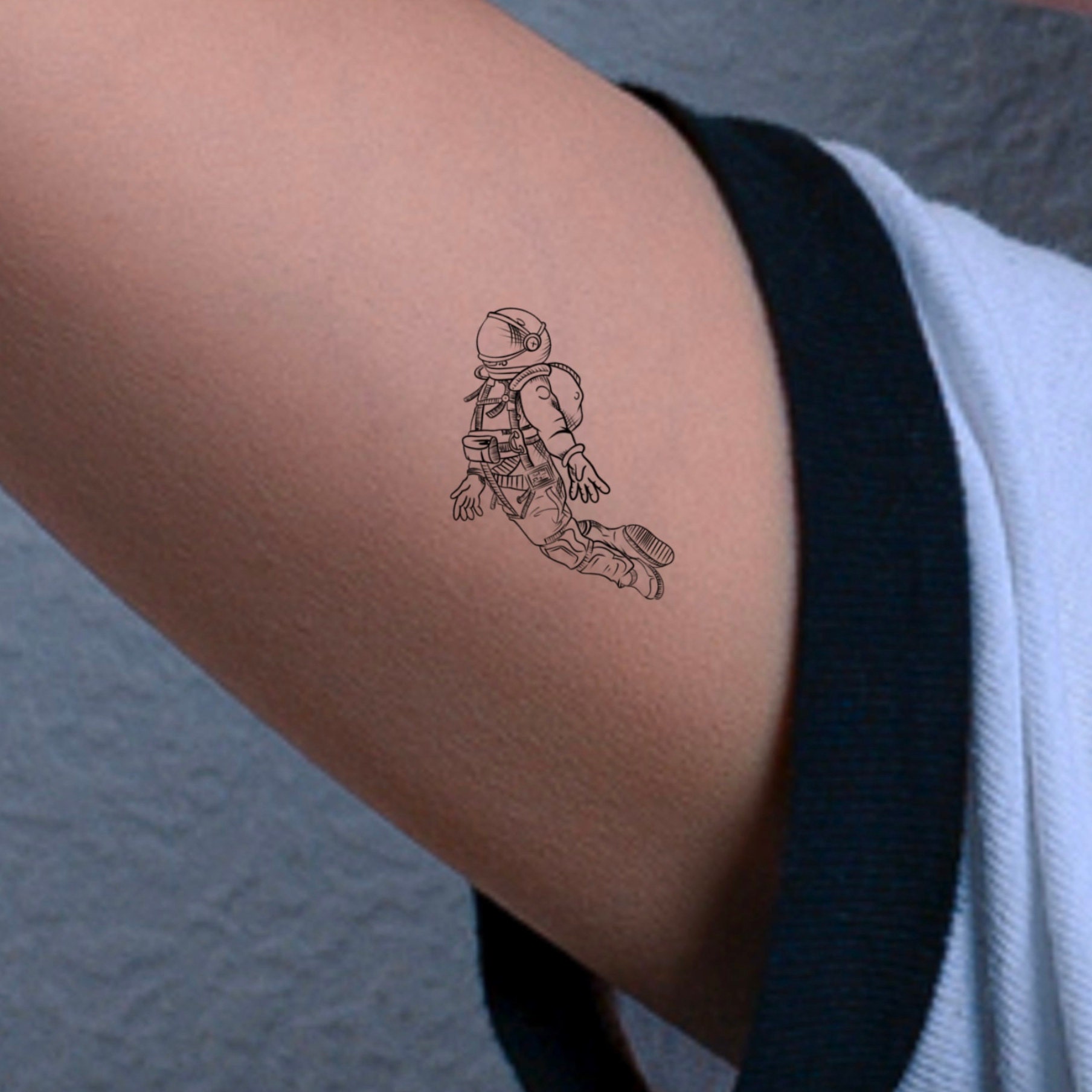 small astronaut tattoo  Cute simple tattoos Cute small tattoos Small  tattoos