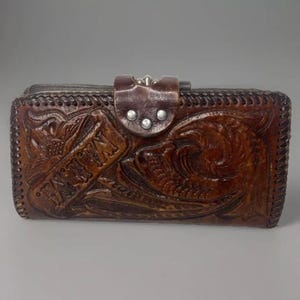 Monedero vintage de cuero marrón hecho a mano con cremallera y flores hechas a mano