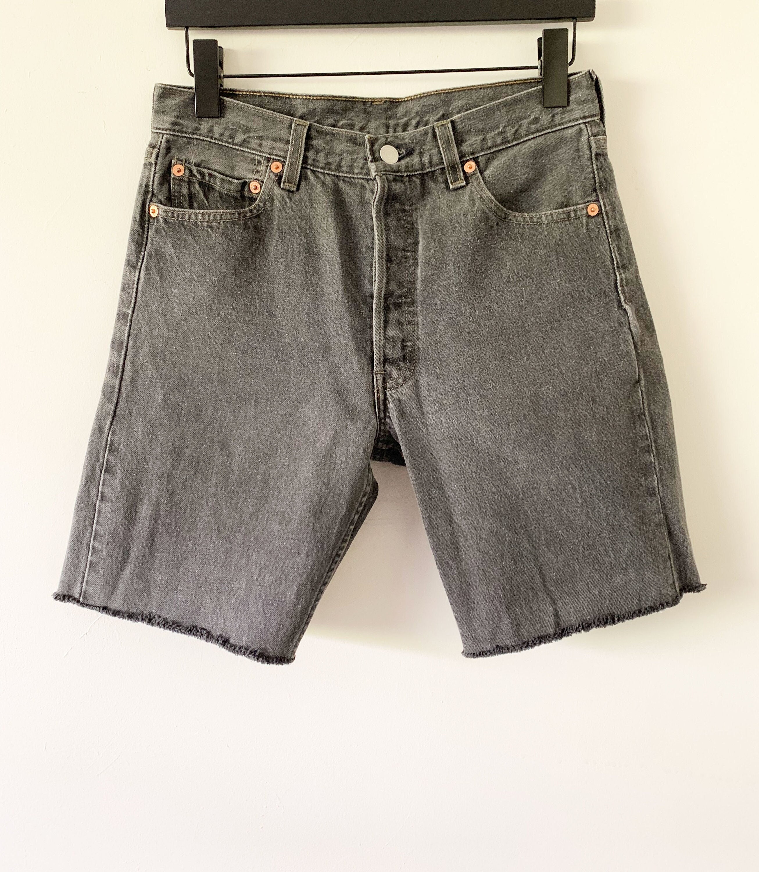Vintage 90s Levi's 501 Faded Black Cut Off/Raw Hem Jeans Made In USA