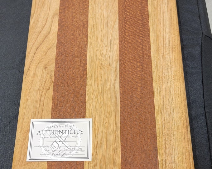 Butternut and Leopard Wood Cutting Board