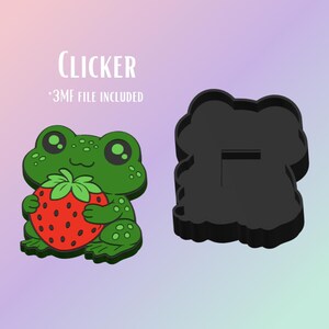 May include: A green frog holding a red strawberry with black seeds. The frog has large, round eyes and is next to a black, cloud-shaped object. The word "CLICKER" is written in white, along with "*3MF FILE INCLUDED".
