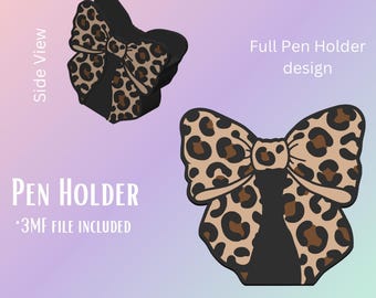 May include: A pen holder with a bow design, featuring a leopard print pattern in tan and brown against a black base. The image includes a side view and a full design view. Text on the image reads "PEN HOLDER" and "*3MF FILE INCLUDED."