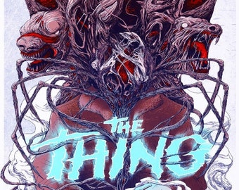 May include: A poster for the 1982 horror film "The Thing" by John Carpenter. The poster features a monstrous, multi-headed creature with sharp teeth and claws, emerging from a human figure. The text "WHAT YOU FEAR MOST... IS AMONG YOU" is at the top of the poster, and the title "THE THING" is in large, blue letters.